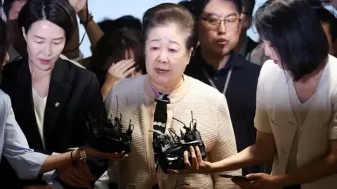 Disputed Religious Head Denies Bribery Accusations Against Former South Korean First Lady